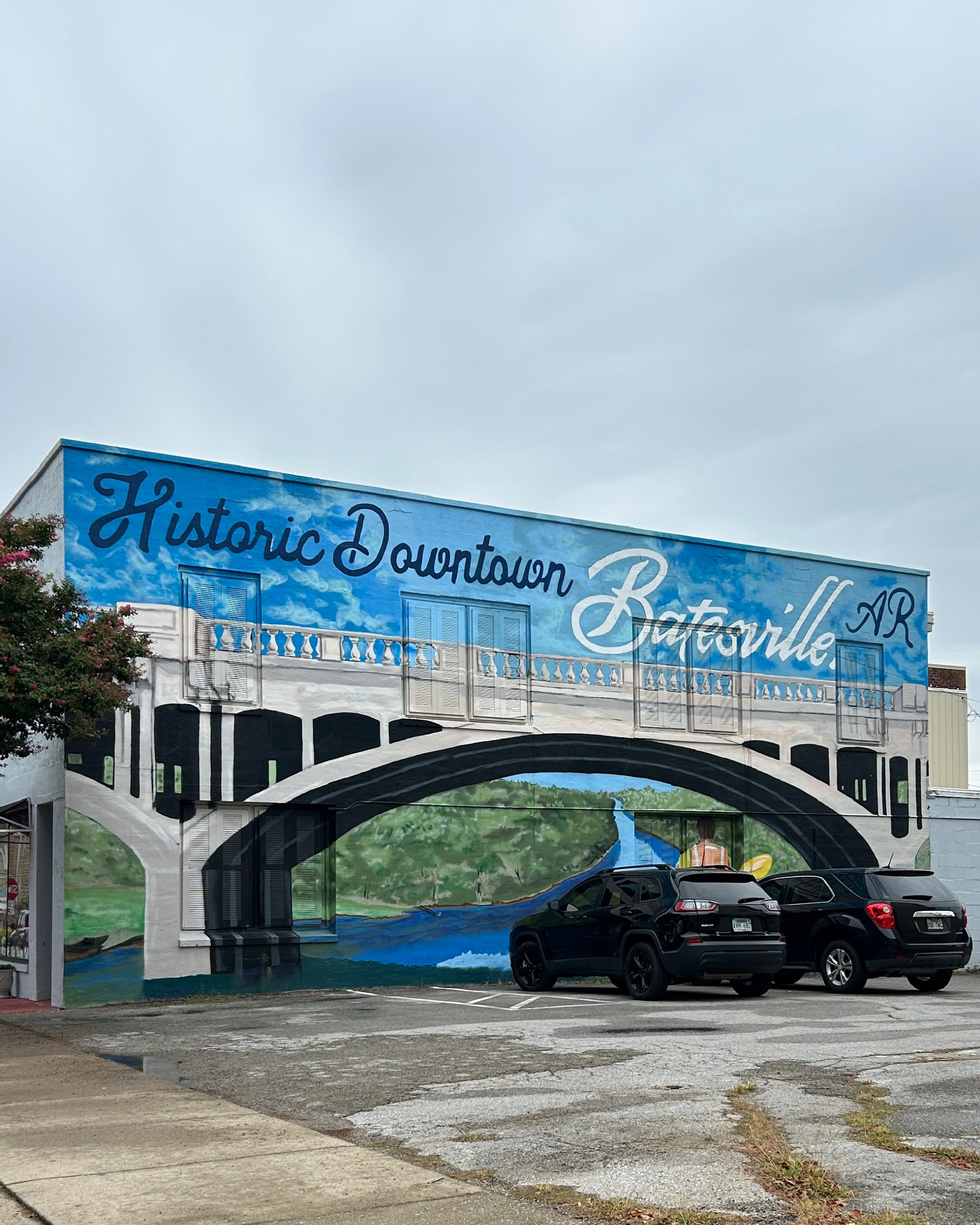 Downtown Batesville Arkansas bridge mural — Building bridges where they matter most with Synergy HR